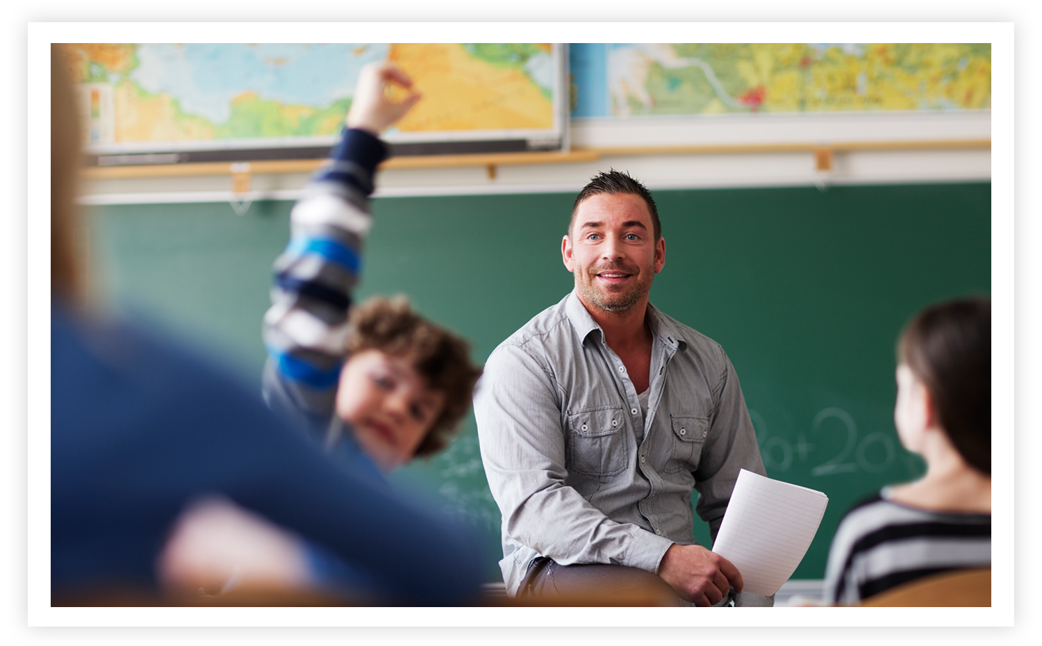 Teacher in classroom with students