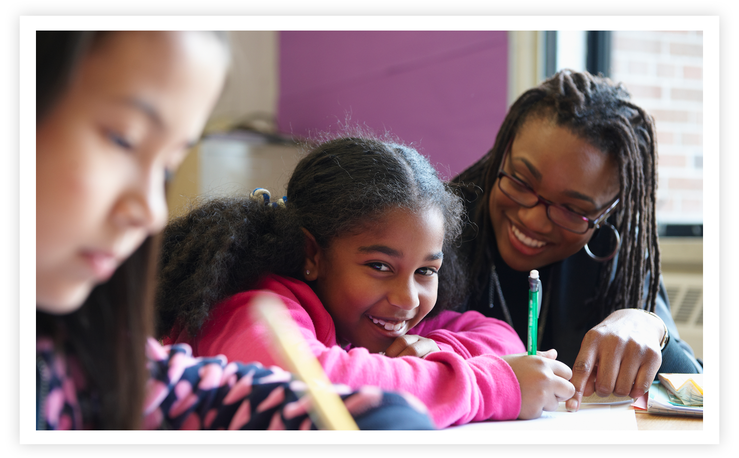Teacher in classroom with students